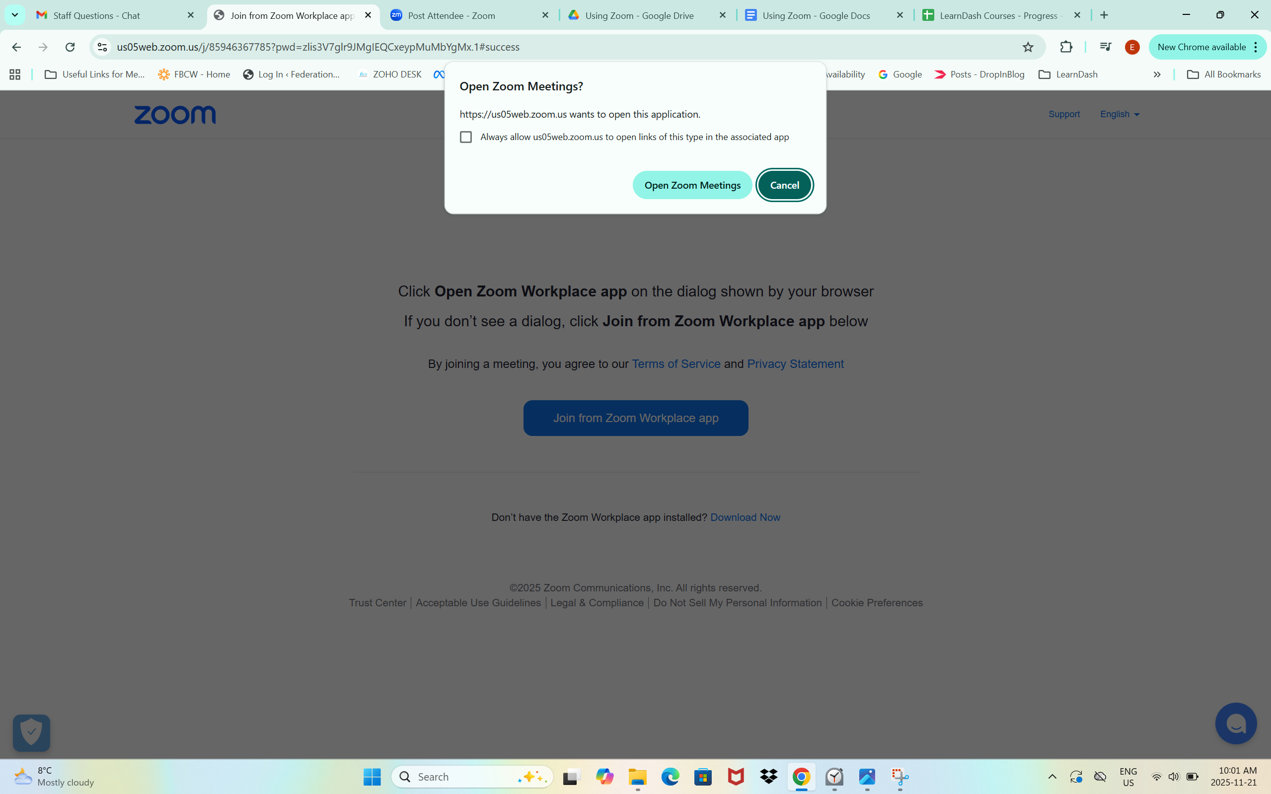 A screenshot of the Zoom website. A pop-up is prompting the user to open the Zoom Meetings app. 